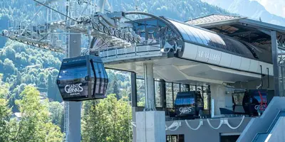 a gondola ride in a ski lift in the mountains at Chalet le jardin de fées in Saint-Gervais-les-Bains