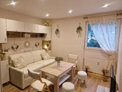 a living room with a couch and a table at Le Mont Bohème in Saint-Gervais-les-Bains