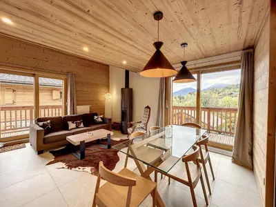 a living room with a glass table and a couch at Bel appartement 4 pièces près du village, parking inclus - FR-1-560-115 in Combloux