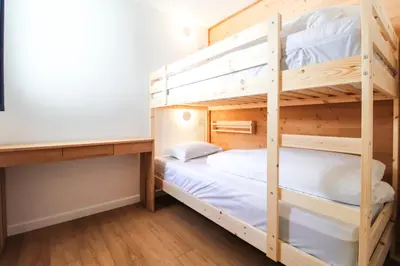 a bunk bed room with two bunk beds at Stunning 4-bedroom apartment Flaine Foret, fully refurbished, beautiful panoramic views in Flaine