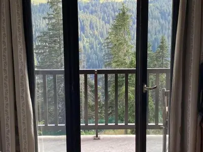 an open window with a view of a mountain at Appartement lumineux · Centre station · 6 pers · Balcon · WI-FI - FR-1-425-205 in Arâches-la-Frasse