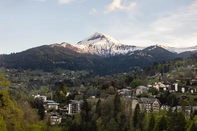 a mountain in the distance with a town and a city at Studio - Le Vorasson Ideal for a duo break in Saint-Gervais! in Saint-Gervais-les-Bains