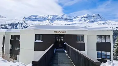 a building in the snow with snow around it at Résidence Verseau - Appartement lumineux et spacieux · Centre station · avec cabine et Balcon MAE-8894 in Magland