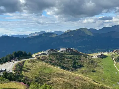 a view of a hill with mountains in the background at Arve et Giffre Samoens 1600 in Samoëns