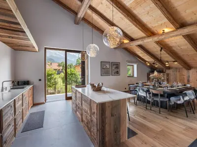 a bathroom with a sink and a tub and a mirror at Chalet convivial à proximité des pistes avec balcon et WIFI - FR-1-663-23 in Saint-Gervais-les-Bains