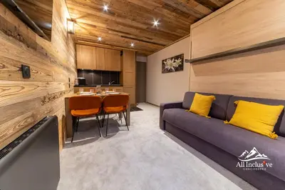 a living room with a couch and a table at 
