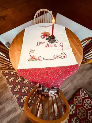 a table with a candle on top of a table at Chez moi in Chamonix-Mont-Blanc
