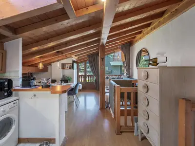 a kitchen with a washer and dryer in it at Appartement 3 ch. à Megève proche centre - FR-1-569-125 in Megève