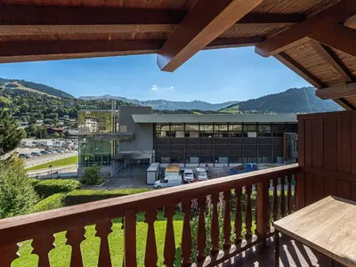 a balcony with a view of a building at Appartement 3 ch. à Megève proche centre - FR-1-569-125 in Megève