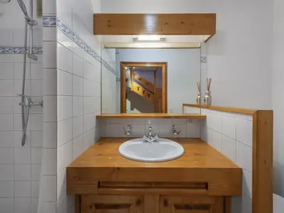 a bathroom with a sink and a mirror at Appartement 3 ch. à Megève proche centre - FR-1-569-125 in Megève