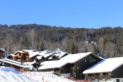 a group of buildings covered in snow at Les Eterlous 28 - Appt montagne 4 pers in Morillon