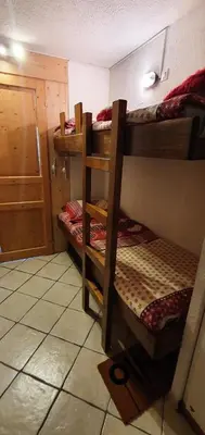 a room with two bunk beds in a room at Résidence Les Coralines Bat A - Coralines A3 MAE-0314 in Megève