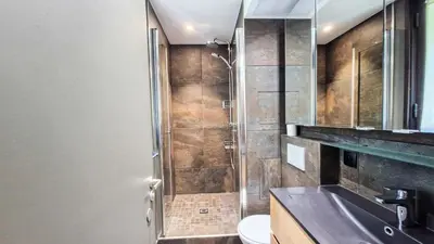 a bathroom with a shower and a sink at Résidence Vega - Studio rénové · Proche des pistes et des commerces MAE-2831 in Magland