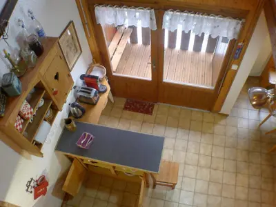 an overhead view of a kitchen with a deck at Appartement 2 pièces avec mezzanine, casier à skis et parking privatif à Samoëns - FR-1-629-135 in Samoëns