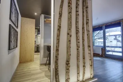 a dining room with a table and chairs at Apartment Sierra in Chamonix-Mont-Blanc