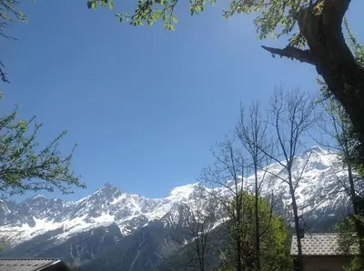 a view of a snow covered mountain range at A 2 min du télécabine Chalet de charme 4 étoiles in Les Houches