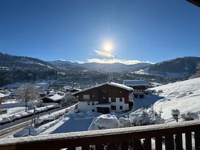 a view of a town covered in snow at Chalet LE REPAIRE proches des Pistes in Megève
