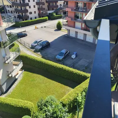 an overhead view of cars parked in a parking lot at Next to the ski lift! *3bed Apt* sleeps 8* Parking* Pool in Saint-Gervais-les-Bains