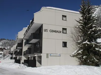 a building with the words us grand hotel on it at Studio rénové à Flaine · Balcon Sud · Idéal pour 4 personnes - FR-1-425-209 in Arâches-la-Frasse
