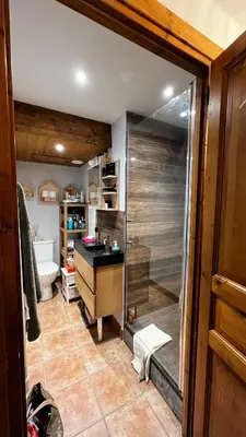a bathroom with a shower and a sink at Hygge and Lykke in Saint-Gervais-les-Bains