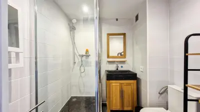 a bathroom with a shower and a sink at Résidence Gemeaux - Studio rénové · Centre station · Balcon MAE-0491 in Magland