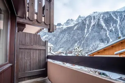 a balcony with a view of a mountain at Les Chamois - Duplex - Vue magnifique in Chamonix-Mont-Blanc