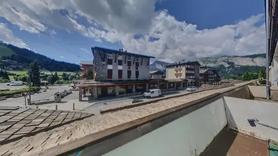 a view of a town with buildings and a street at 3 Pièces 6/8 Pers centre Carroz (AA111) in Les Carroz d'Araches
