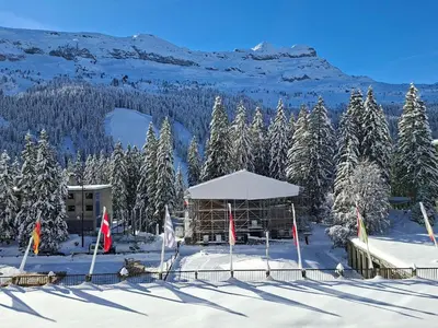 a gazebo in the snow with trees and mountains at Appartement confortable · Proche pistes · WIFI gratuit - FR-1-425-211 in Arâches-la-Frasse