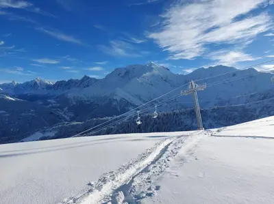 a ski lift on top of a snow covered mountain at Appartement Saint Gervais proche centre in Saint-Gervais-les-Bains