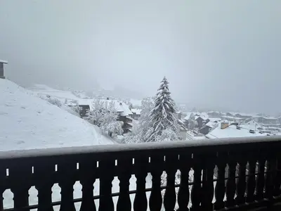 a snow covered yard with a christmas tree in the background at Duplex de 100m² pour 9 personnes au centre proche remontées mécaniques - FR-1-572-290 in Arâches-la-Frasse