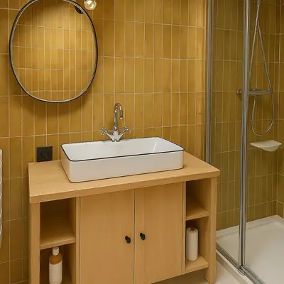 a bathroom with a sink and a shower at Chalet Anatole - Vue Mont Blanc Exceptionnelle in Saint-Gervais-les-Bains