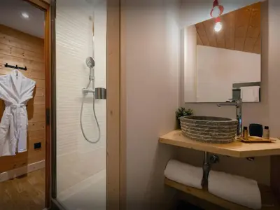 a bathroom with a shower and a sink at Chalet Evonyx - OVO Network in Samoëns
