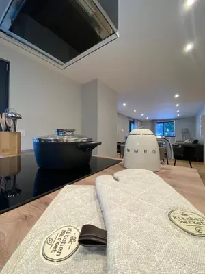a spa room with a chair and a sink at Appartement PISTE ROUGE in Les Houches