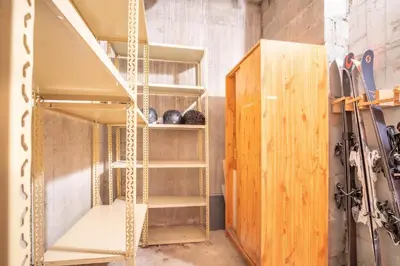 a room with a ladder and a shelf at Les Tussilages - Terrasse vue Mont-Blanc in Chamonix-Mont-Blanc