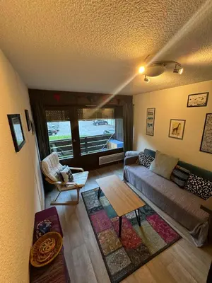 a kitchen with a table and a counter top at Hike, Bike, Ski, open the door and Go! in Saint-Gervais-les-Bains