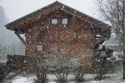 a large brick building in the snow at Chalet Indépendant 