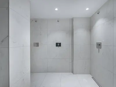 a bathroom with white tile walls and a white tile floor at Chalet avec spa partagé, 5 chambres, piscine, parkings à Megève - FR-1-569-187 in Megève