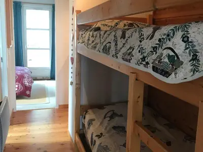 a bedroom with a bunk bed in a room at Appartement confortable 2 chambres, balcon sud, 6 pers. - FR-1-425-213 in Arâches-la-Frasse