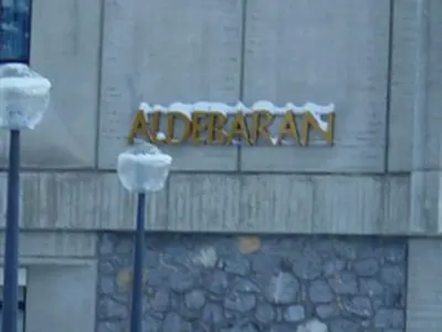a sign on a building with snow on it at Appartement spacieux, balcon - 8 pers. - FR-1-425-218 in Arâches-la-Frasse