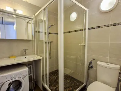 a bathroom with a shower and a toilet and a sink at Appartement spacieux, balcon, skis aux pieds - 8 pers. - FR-1-425-216 in Arâches-la-Frasse
