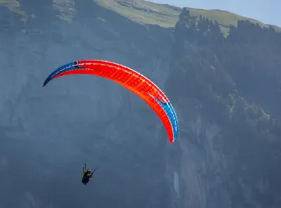 a person para sailing in the air with a parachute at Samoëns, new apartment, 3 bedrooms, 6 persons, close to village centre and skibus in Samoëns