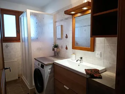 a bathroom with a sink and a washing machine at Résidence La Planchette - L'Alpin - 4 pièces dans un chalet individuel MAE-7861 in Saint-Gervais-les-Bains