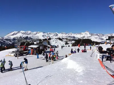 a snow covered mountain range with a ski slope at Le Grand Panorama No11 in Saint-Gervais-les-Bains