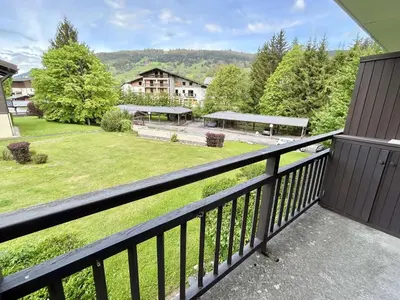 a balcony with a view of a park at Charmant studio avec balcon exposé sud, casier à skis et parking, proche des pistes à Demi-Quartier - FR-1-597-175 in Demi-Quartier