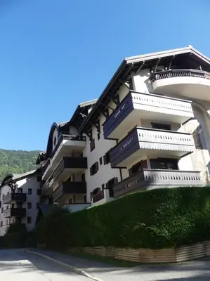 a large building with balconies on the side of it at Appartement à 50m des remontées in Saint-Gervais-les-Bains