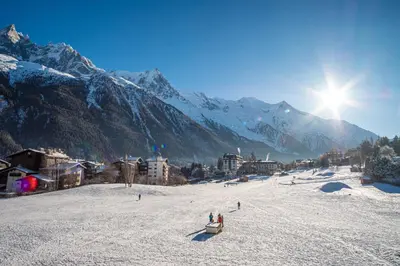 a group of people standing on a snow covered mountain at Le Savoy 2 - Pied des pistes - Centre in Chamonix-Mont-Blanc