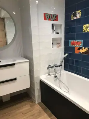 a bathroom with a bath tub and a sink at Maison Sallanches 12 couchages in Sallanches