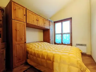 a bedroom with a bunk bed and a window at Résidence Aigle Royal - L'Aigle Royal MAE-7671 in Les Houches