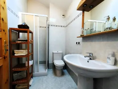 a bathroom with a sink and a toilet and a shower at Résidence Aigle Royal - L'Aigle Royal MAE-7671 in Les Houches