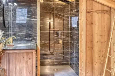 a bathroom with a shower and a sink at chalet Louis situé 25 km Chamonix in Saint-Gervais-les-Bains
